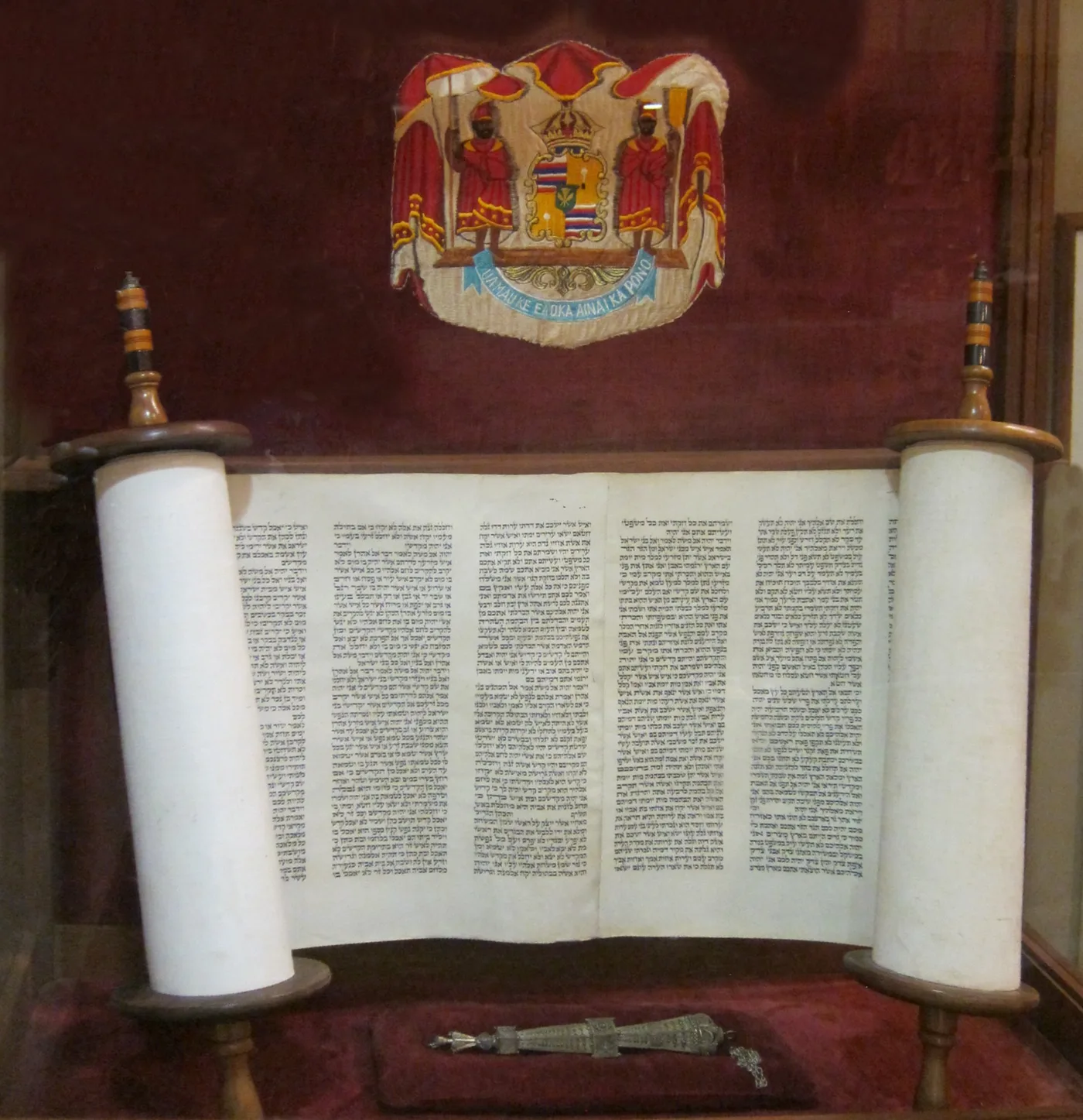 Detail of a Torah scroll and pointer, symbolic of a Bar or Bat Mitzvah occasion