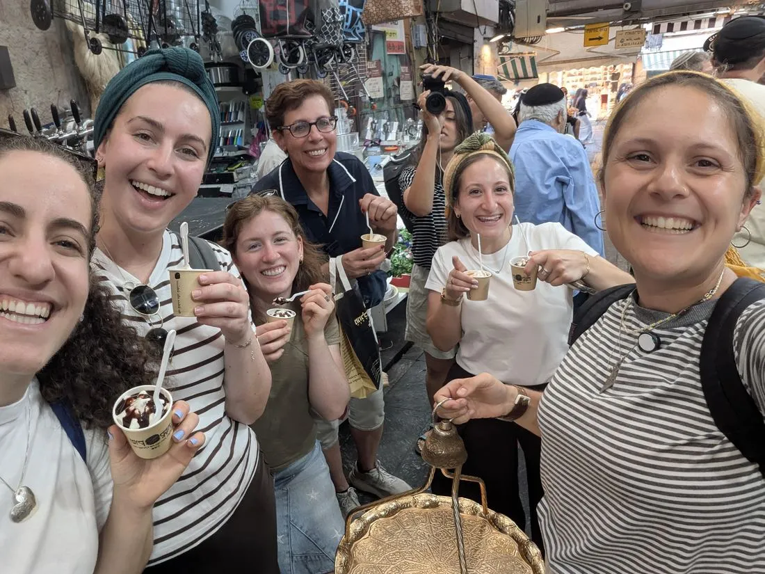 Tourists enjoying sundaes on a Mahane Yehuda food tour