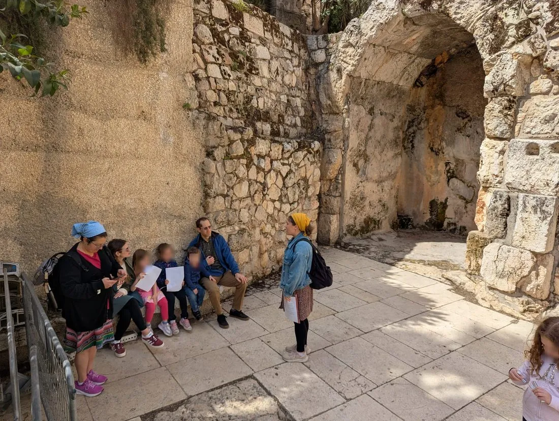Orit guiding a family through the Old City of Jerusalem